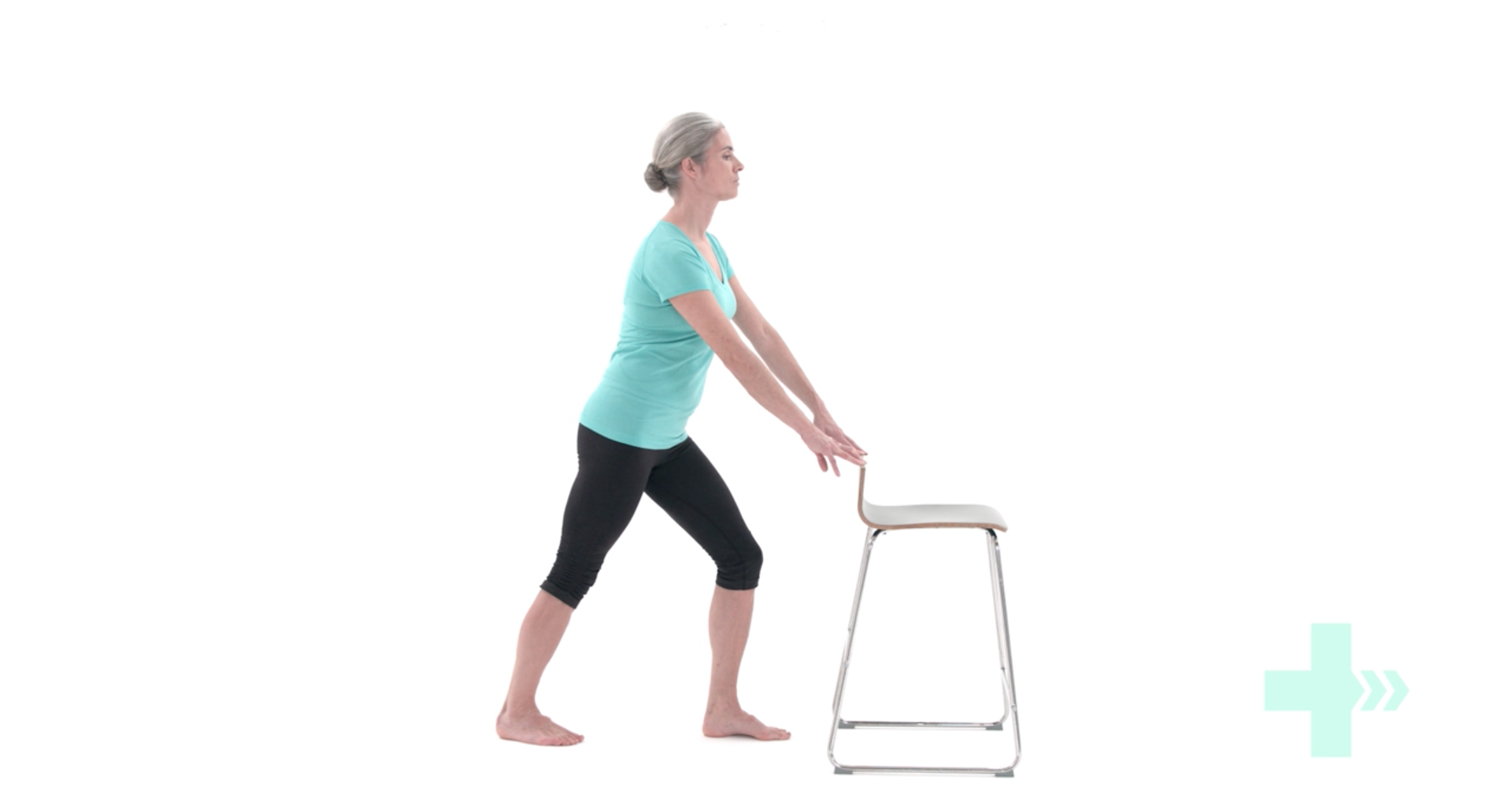 woman performing a stand calf stretch