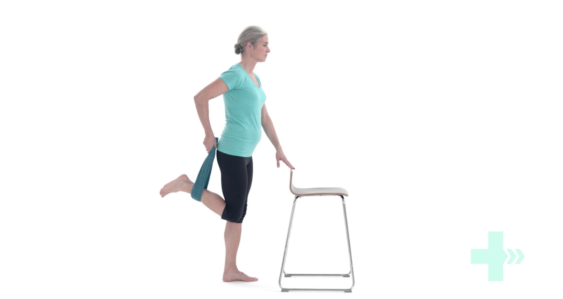 woman performing a quad stretch