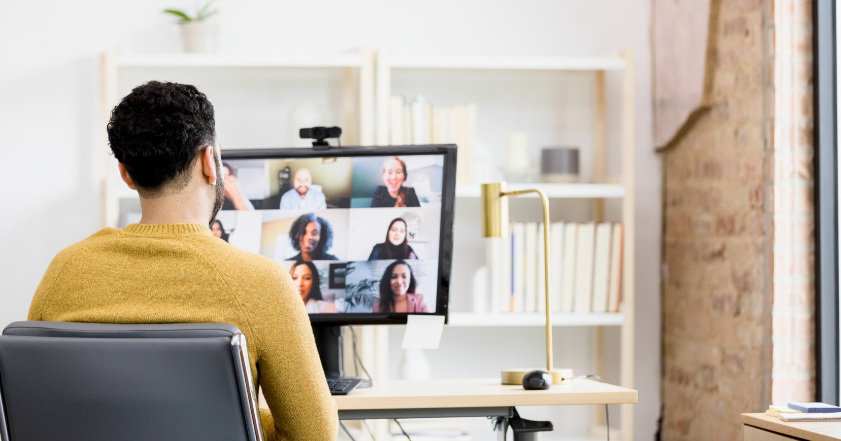 young man in a video call working remotely
