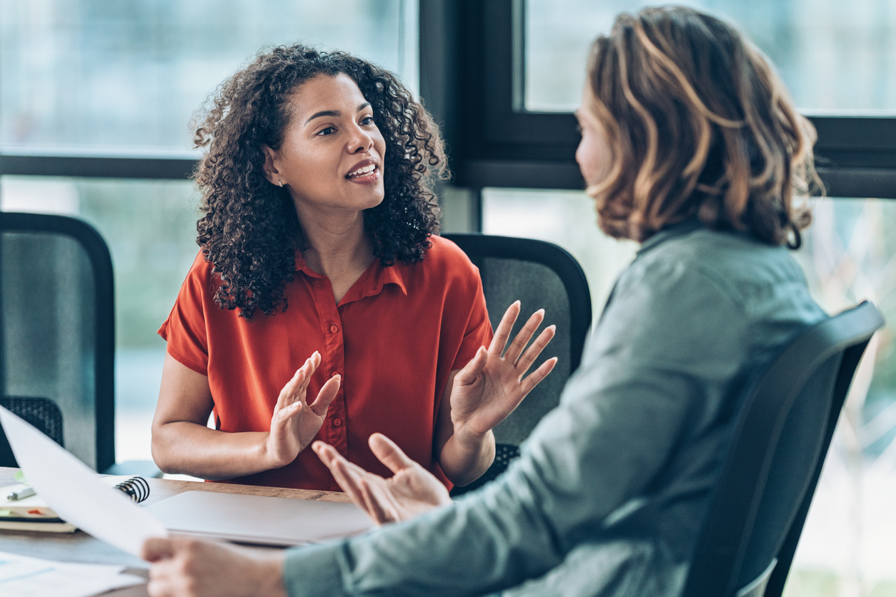 manager and employee in a discussion